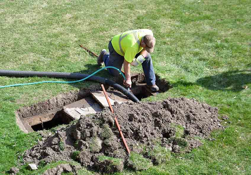 Septic tank being pumped