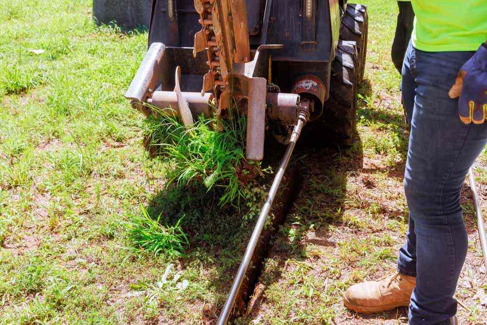 Sloan’s Septic Tank technician working with trenchless repairs Sloan’s Septic Tank technician working with trenchless repairs